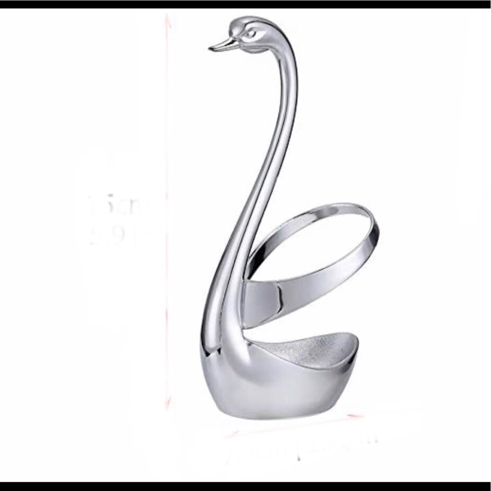 Pair of silver Swans base holders ( never used)